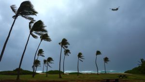 Hurricane Lowell moves past Hawaii, leaving heavy rain, strong winds and flooding threat