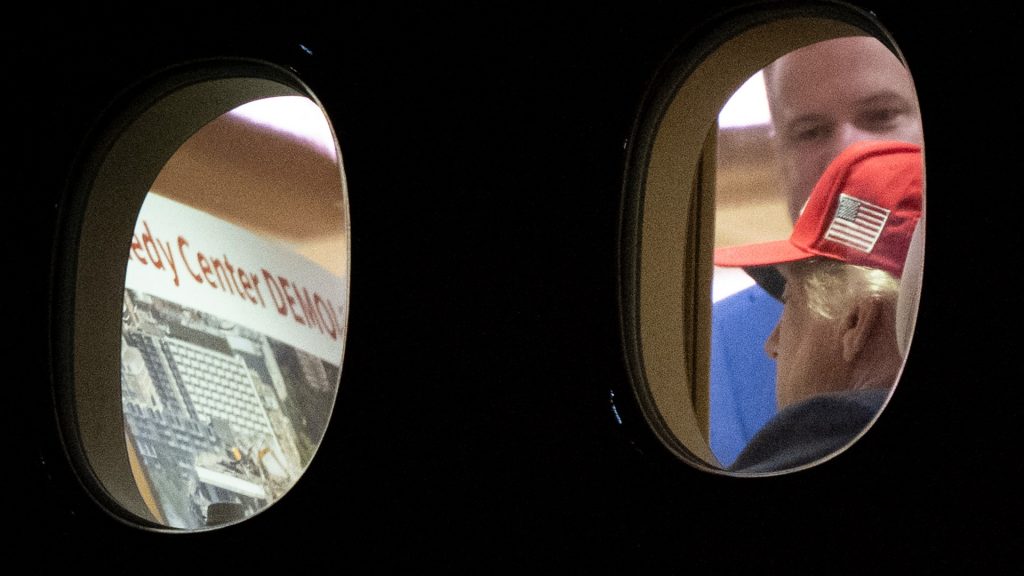 Trump looks at ‘Kennedy Center DEMOLISHED’ image as judge sets new rule