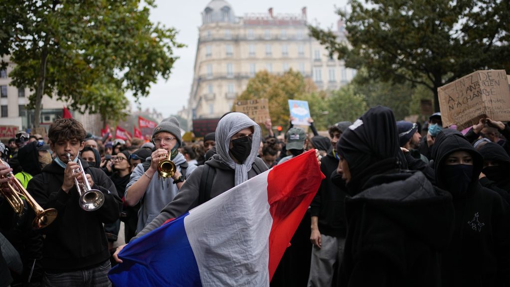 Emmanuel Macron addresses France after 2,000 arrested during huge day of protests 