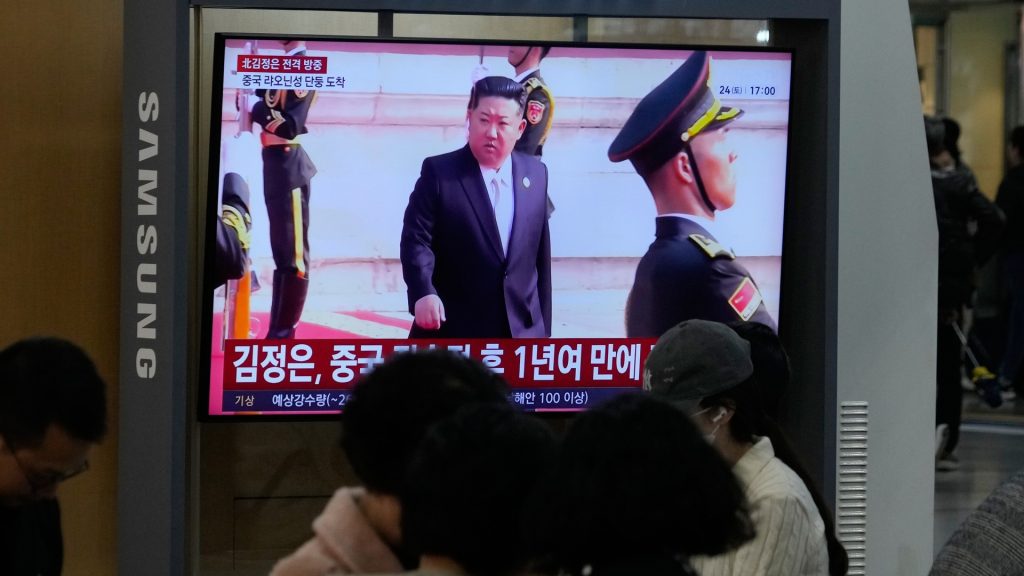 Kim Jong Un Visits China as new border bridge signals expanding trade