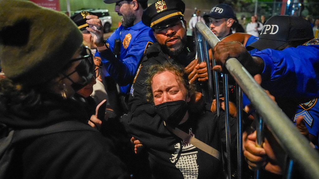Protesters clash with police after ICE agent shoots man with 5-year-old in car